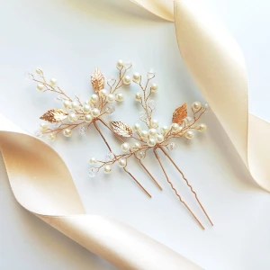 Sada dvou zlatých svatebních pinet s lístky, krystaly a perlami